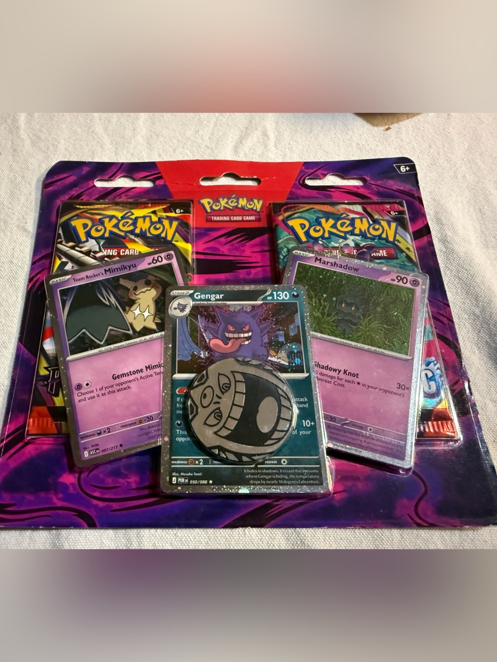 2- Pack Pokemon Purple and Red Booster Pack & Holo Card Assortment